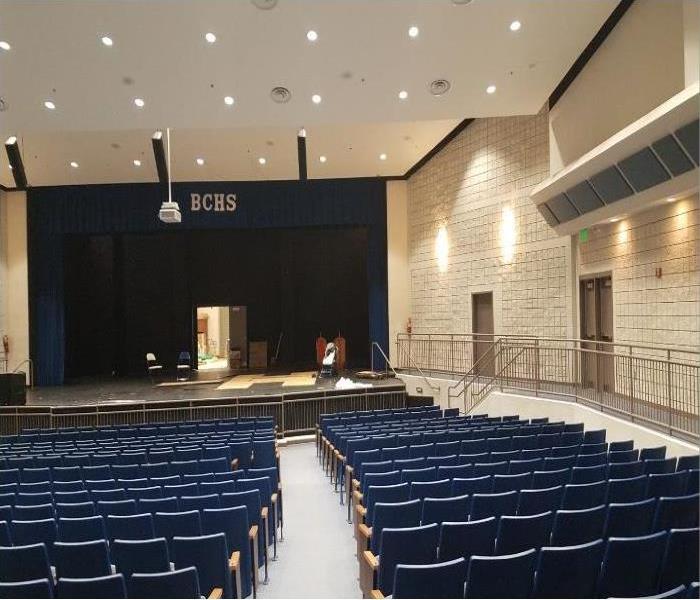 School auditorium that was flooded with rain water